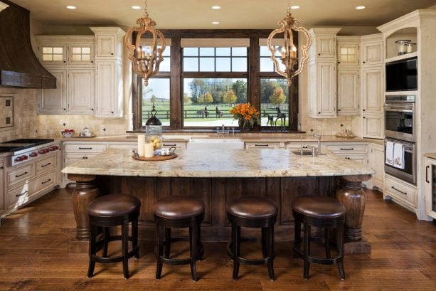 modern rustic kitchen with a combination of distressed white cabinets and wood elements