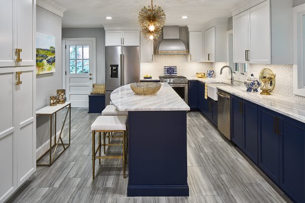 gray ciudad kitchen floor tile with dark blue cabinets