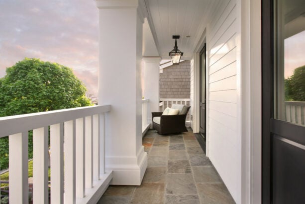 shadow grey stone tile flooring for a classic balcony