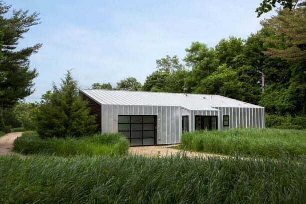 gray vertical metal siding with a shed roof to create a seamless look