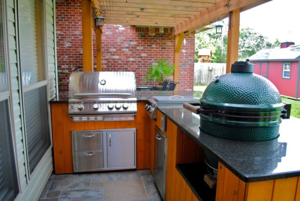 timeless outdoor l-shaped kitchen structured with exposed posts and beams