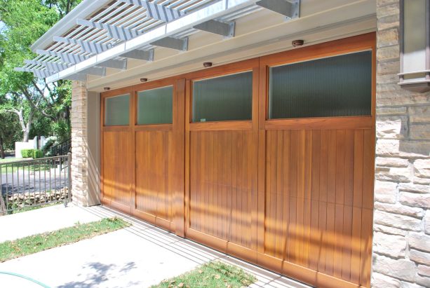 carriage-style garage door with rectangular windows in mid-century design