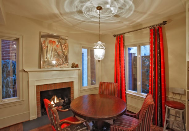 brick fireplace with mid-century modern narrow mantel