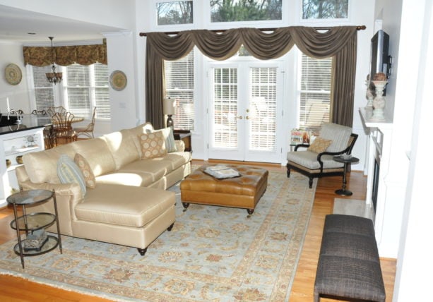 combination of aluminum blinds and attached curtain to the rod as a window treatment for french door to a patio