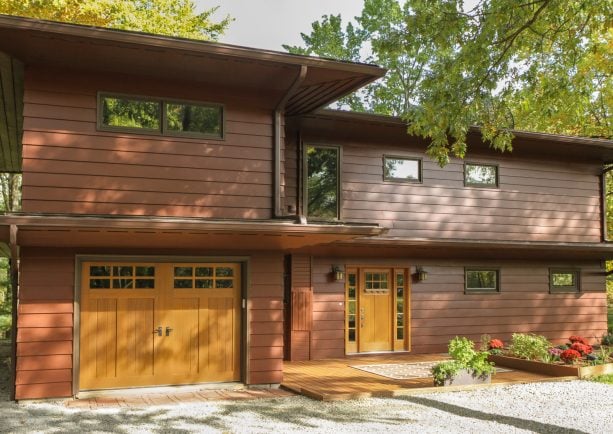 insulated carriage style mid-century garage doors with faux wood look