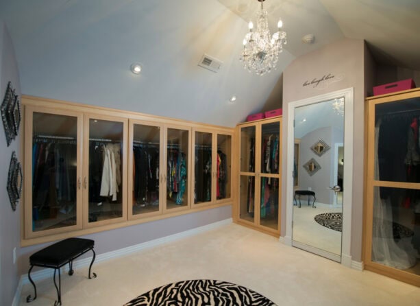 angled attic closet idea with glass doors