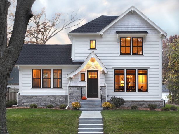 a black and white color scheme is applied to the roof and the siding of the house