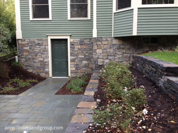 dark green hinged walkout basement door option with white trim