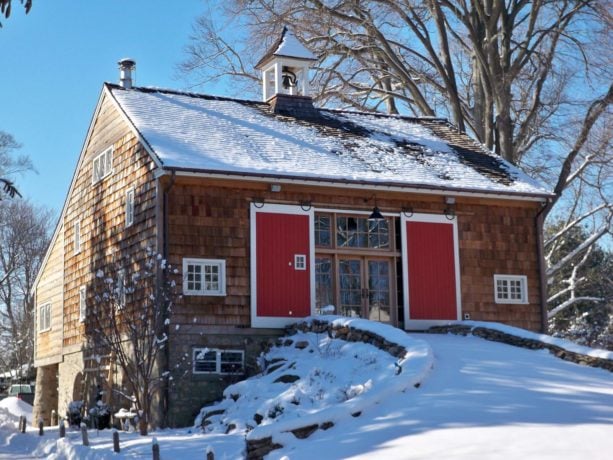 red and white double plank barn front door for a farmhouse exterior design