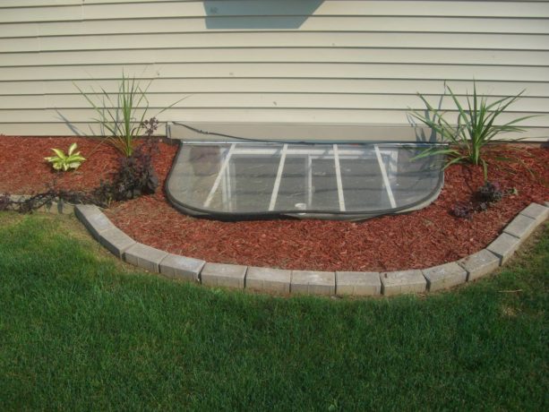 traditional basement window well ideas with cover