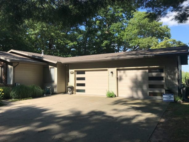 steel garage doors with long panels in mid-century design