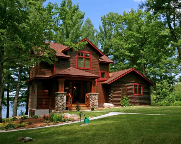 two-story wood log cabin with valspar cherry pickin color for the trim exterior