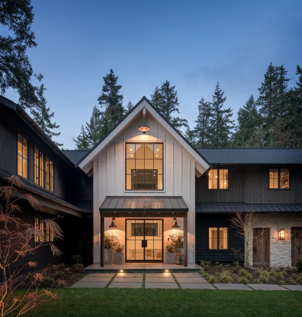 black and white house color combination completed with dark metal roof