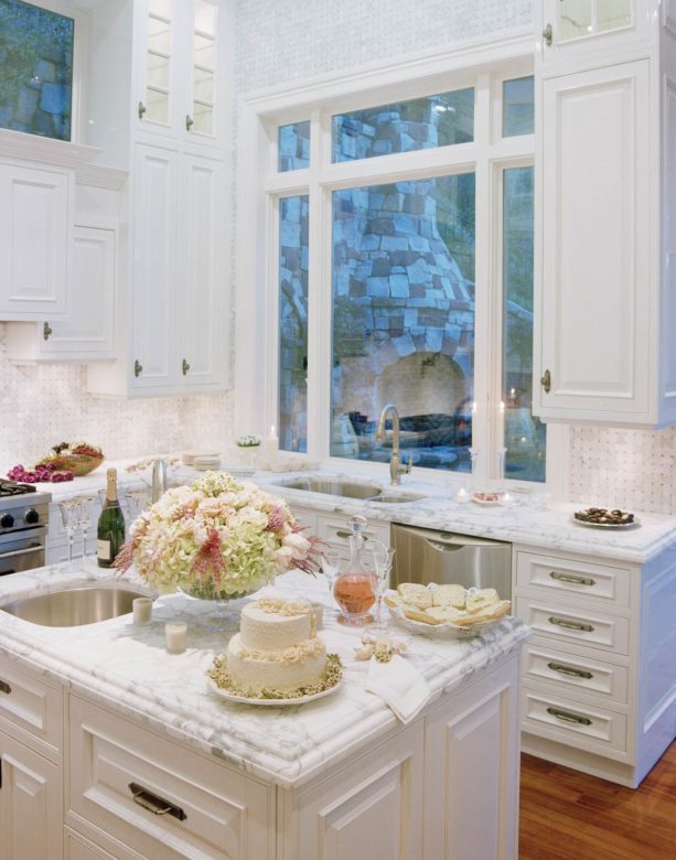 cottage chic kitchen with white picture window over top mount sink