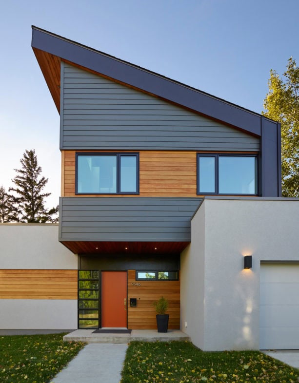 iron gray hardie plank with clear cedar color combination with metal roof house