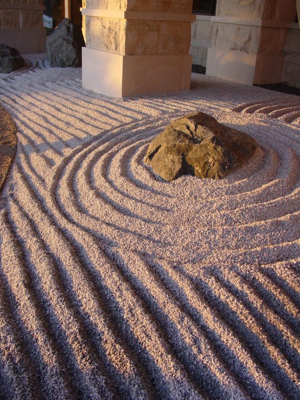 rock garden with raked crushed granite and no plants