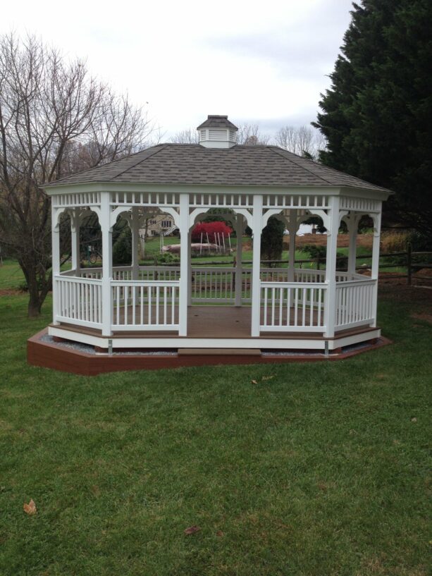 oblong gazebo on a deck with a craftsman style