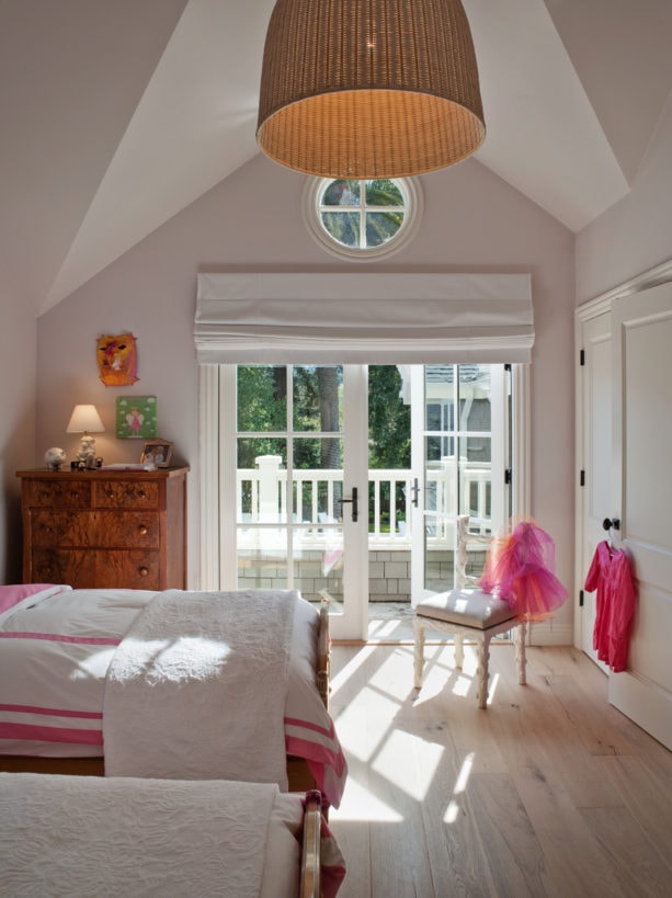 roman shade with blackout lining window treatment for a traditional french door to a patio