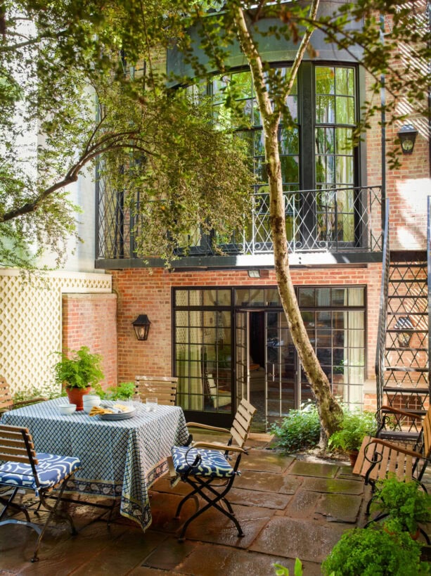 traditional bluestone patio in a craftsman townhouse with no cover