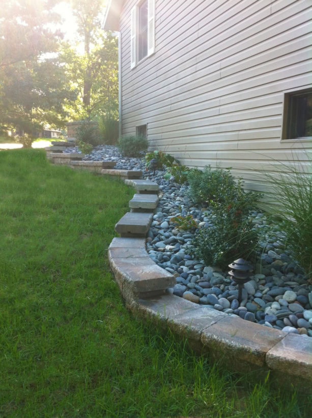 stepped retaining wall ideas down the gradual steep slope