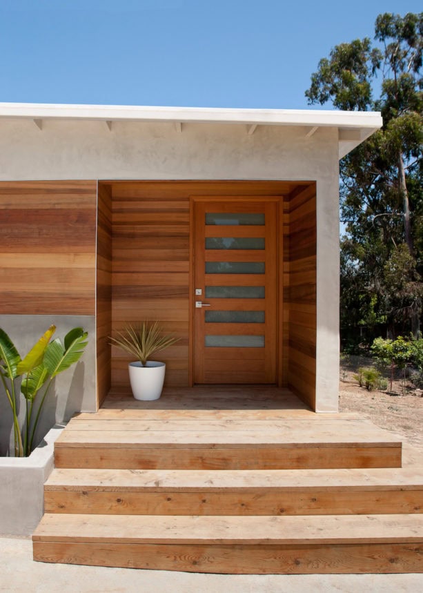 entry concrete steps covered with light tone wood