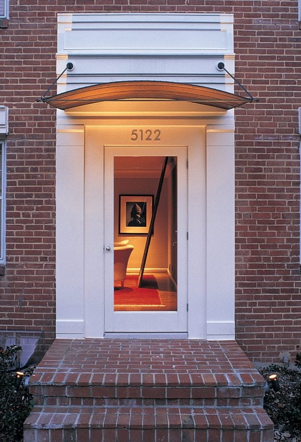 vaulted copper awning to create a dramatic effect on the front door