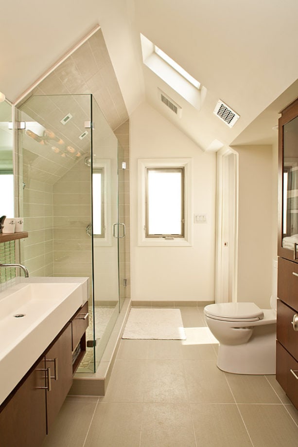 small and trendy master bathroom with a trough sink and without a tub