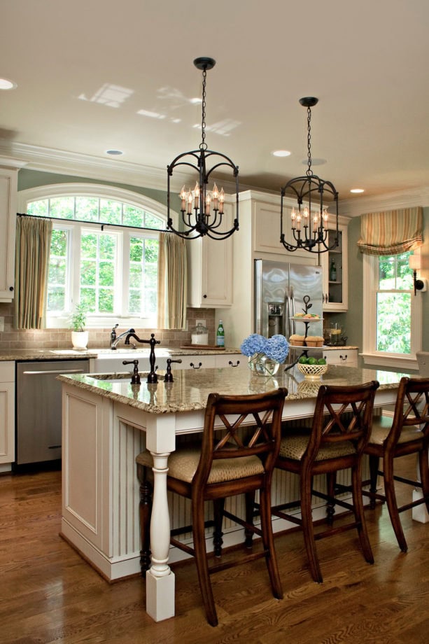 traditional kitchen with a standard undermount sink and picture windows over