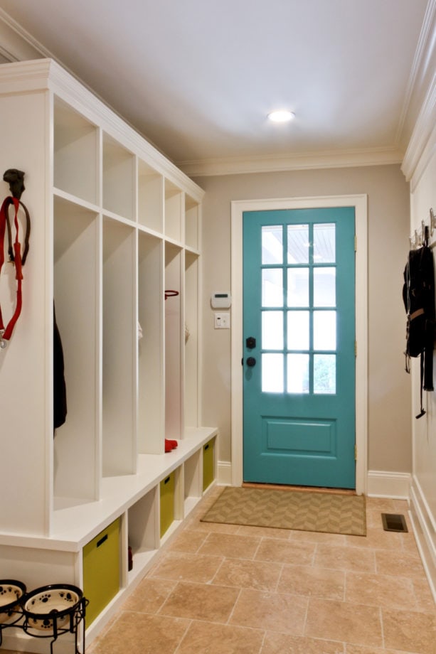 classic small entryway with travertine flooring