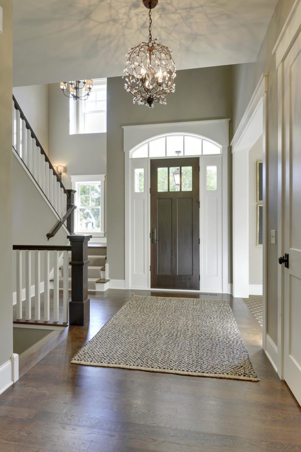 traditional foyer entryway with white oak flooring