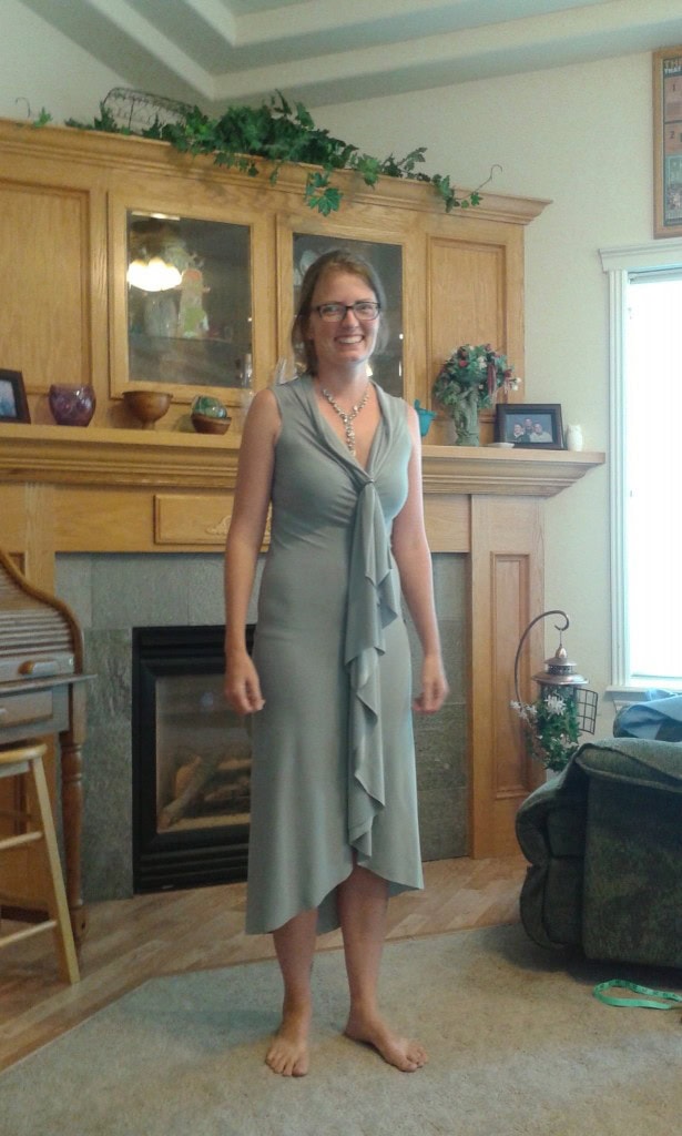 I'm a bridesmaid so I had to make me a dress too, this is BY FAR the easiest dress I've ever made. It took 5 minutes and 1 20"seam. I found an earring to finish it and it was silly how simple it was, I had to ask my mom to make sure it didn't look like crap, I didn't trust it!