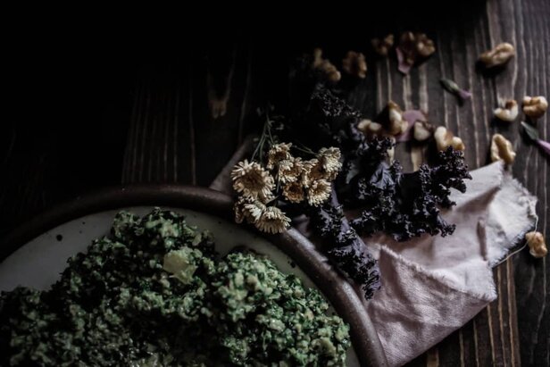 a plate of vegan lemon balm pesto with kale and preserved lemon