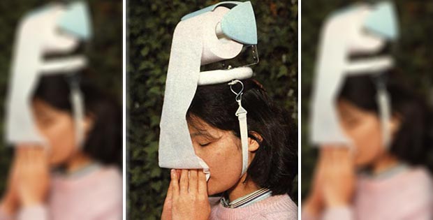 On-head mounted toilet paper dispenser