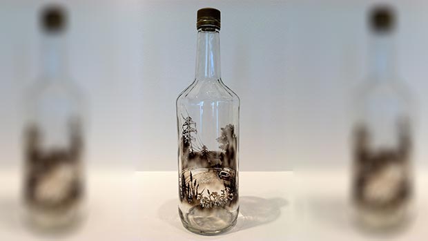 Smoke paintings on the bottle by Jim Dingilian 