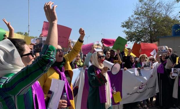 Afghan women attend a protest against their country's Taliban rulers, in Islamabad, Pakistan, on International Women's Day, March 8, 2023.