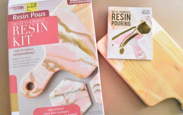 Do-It-Resin Kit box frot, instructions, and wooden cheese board