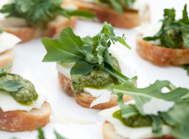 Mozzarella, Pesto, and Arugula Crostini