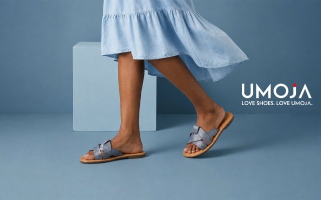 Promotional image of a person wearing woven sandals with UMOJA branding and the slogan “Love shoes. Love UMOJA.”