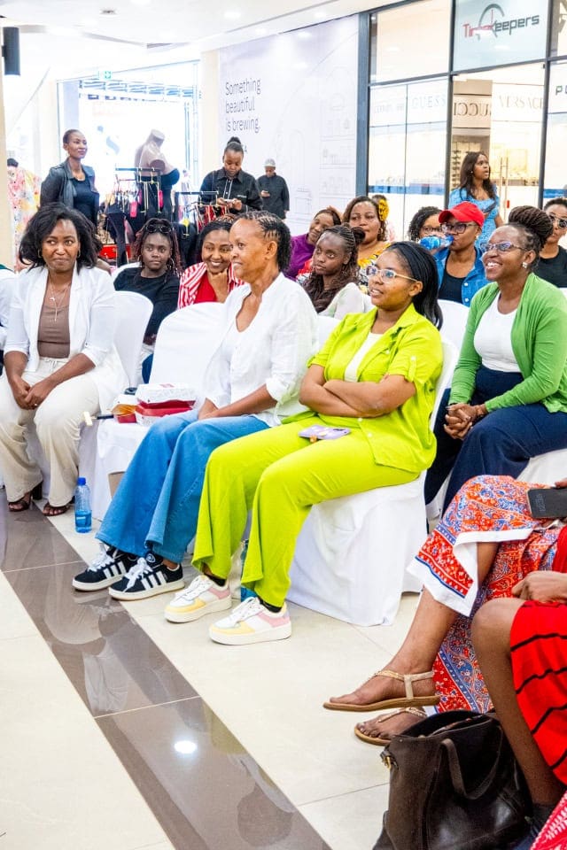 A diverse audience attends Style, Shop & Sip with Connie Oluoch in the shopping mall.