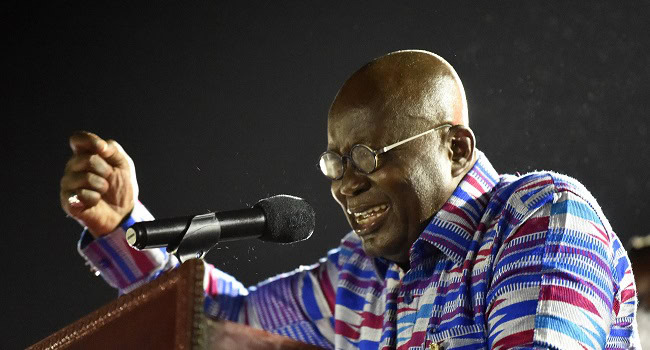President and candidate of the ruling New Patriotic Party (NPP) Nana Akufo-Addo addresses supporters during the final day of campaigning at James Town in Accra, on December 5, 2020. - Defeaning vuvuzelas and party songs took over Ghana's capital Accra on Saturday, the final day of campaigning ahead of presidential and parliamentary elections. Twelve candidates, including three women, are vying for the west African nation's top job, but Monday's vote is essentially a fight between President Nana Akufo-Addo, 76, and former head of state John Mahama. (Photo by PIUS UTOMI EKPEI / AFP)
