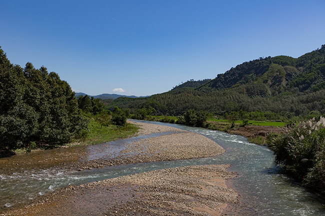 Lots of farmland left and right of the river