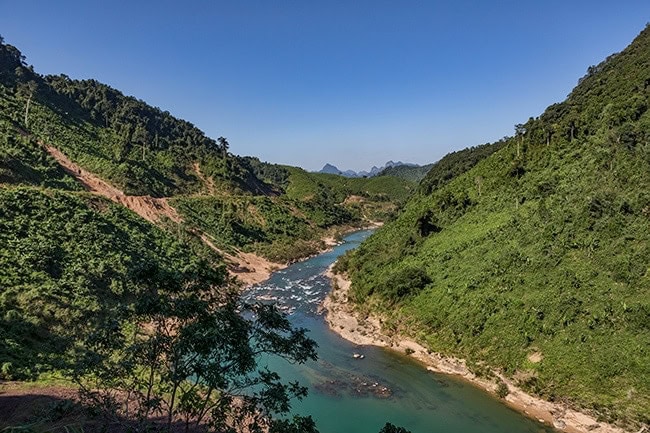 For a while the road follows the river towards the next mountain range