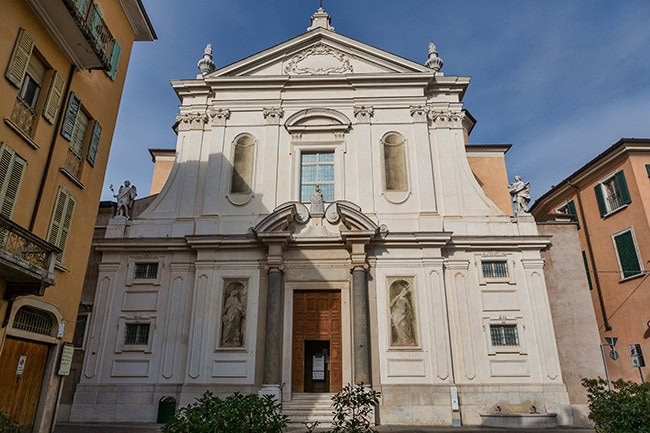 The two columns are from the ancient Basilica of San Pietro de Dom that was demolished in 1603 to make space for the new Duomo