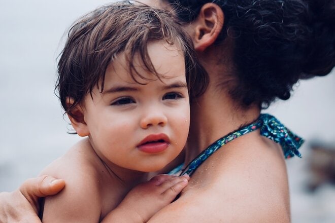 mother and toddler swimming