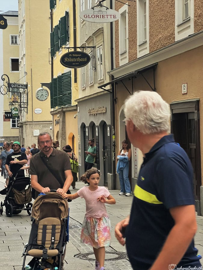 Crowd moving in the historical street of Salzburg