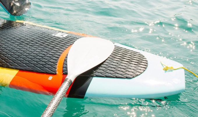 Solid or foam stand up paddle boards sit lower in the water than ISUP's