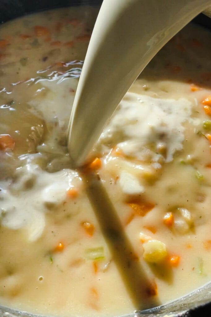 Celery, carrot, onion and garlic sofrito with broth and milk for an Easy and Nutritious Chicken Pot Pie. | Paula's Apron Recipe