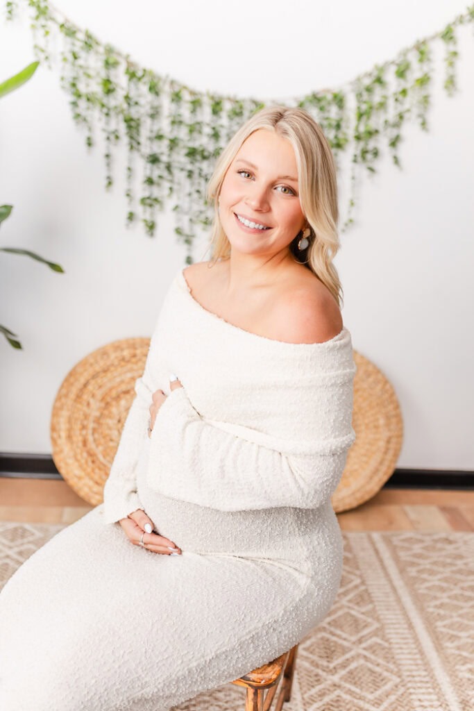 Soft neutral studio backdrop for maternity spring mini sessions in Farmington CT