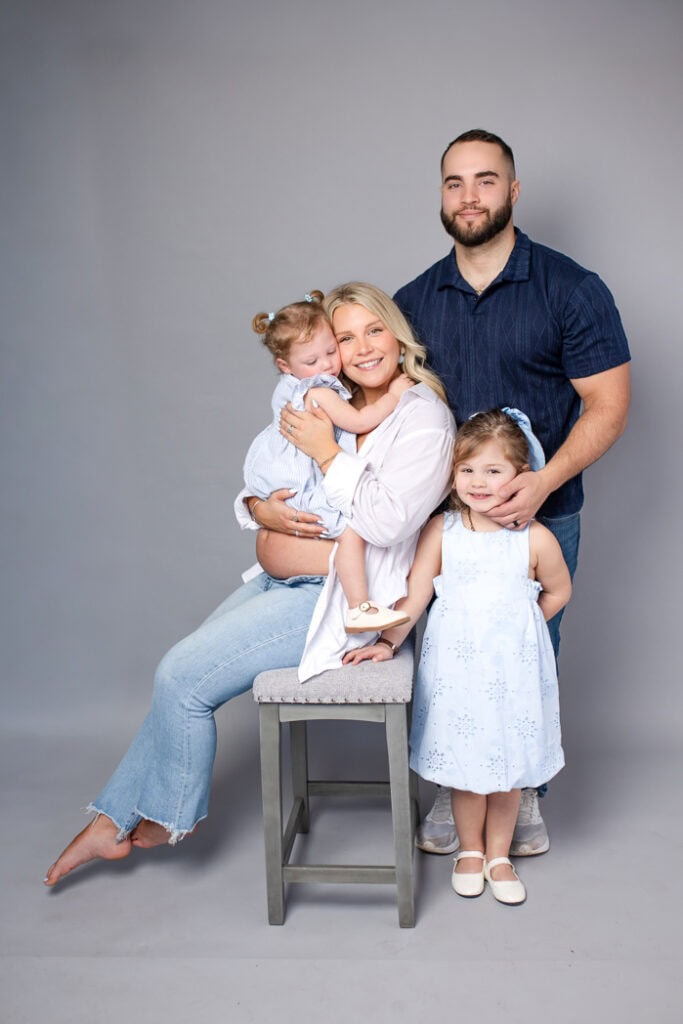 Studio spring mini session in Connecticut with family in neutral outfits