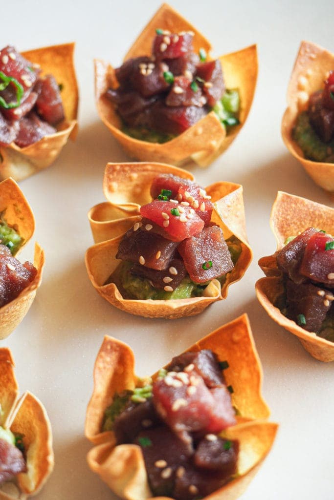 Crunchy Tuna Tartare Wonton Cups to impress your family and friends with an appetiser. They're restaurant worthy with their crunchy wonton base stuffed with an avocado mash and topped with a delicious tuna tartare. They're not only mouthwatering but also incredibly easy to make. | Paula's Apron Recipe